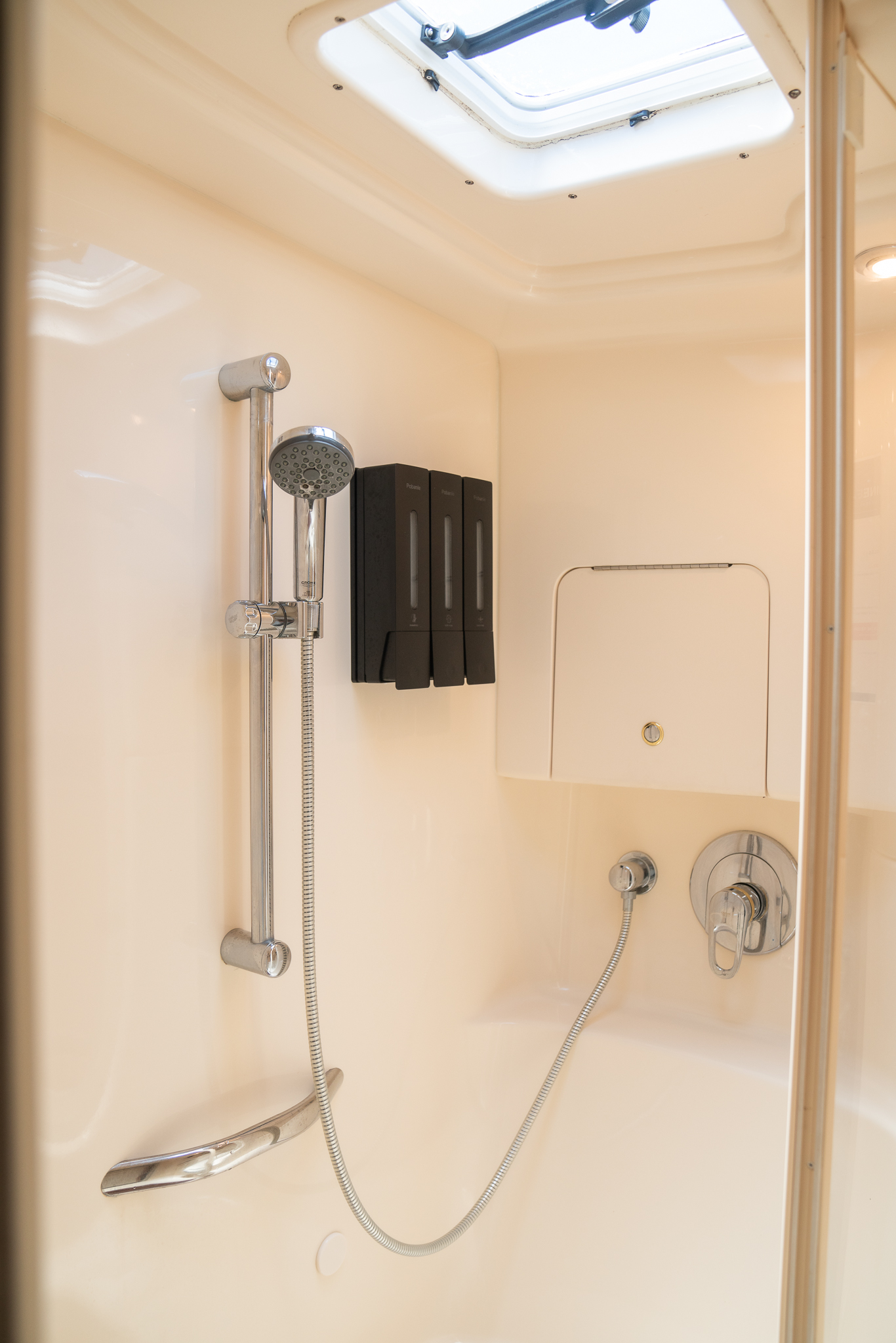 Soulshine bathroom with shower, toilet, and sink